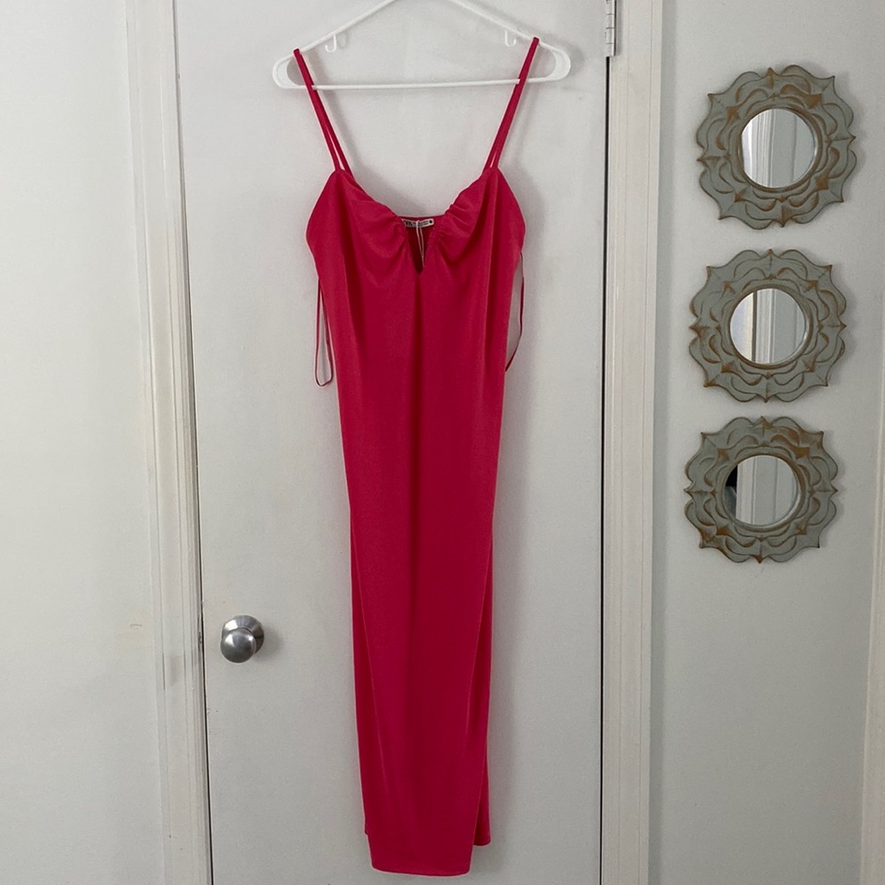 Zara: brand new never worn hot pink body con with deep V neckline.